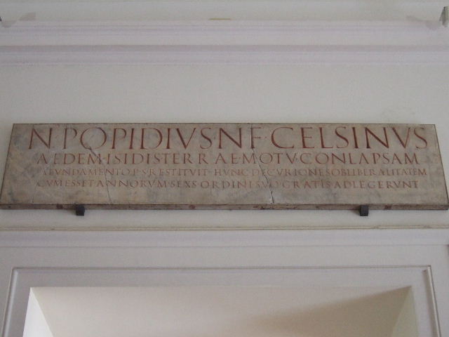 VIII.7.28 Pompeii. Inscription in honour of Numerius Popidius Celsinus: 
N(VMERIVS) POPIDIVS N(VMERII) F(ILIVS) CELSINVS
AEDEM ISIDIS TERRAE MOTV CONLAPSAM
A FVNDAMENTO P(ECVNIA) S(VA) RESTITVIT. HVNC DECVRIONES OB LIBERALITATEM
CVM ESSET ANNORVM SEXS ORDINI SVO GRATIS ADLEGERVNT.       [CIL X 846]
Numerius Popidius Celsinus, son of Numerius, at his own expense restored from its foundations the Temple of Isis, which had collapsed in the earthquake. 
Because of his generosity, although he was six years old, the councillors enrolled him into their number without fee. 
Now in Naples Archaeological Museum. Inventory number 3765.
See Cooley, A.E. and M.G.L., 2004, Pompeii, A Sourcebook, London and New York, Routledge, p. 31, no. C5. 
