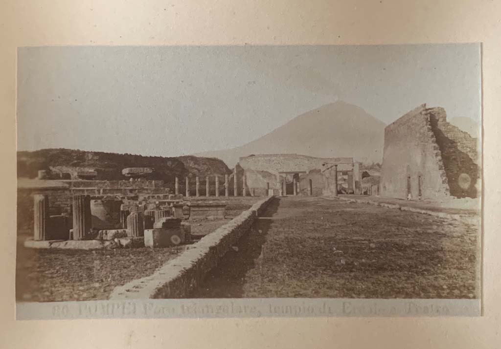VIII.7.32 Pompeii. Album by M. Amodio, c.1880, entitled “Pompei, destroyed on 23 November 79, discovered in 1748”.
Looking north-east from Tholos towards west side of Large Theatre. Photo courtesy of Rick Bauer.
