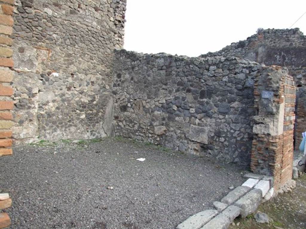 IX.2.3 Pompeii. December 2007. South wall of shop and threshold or sill of entrance doorway.
