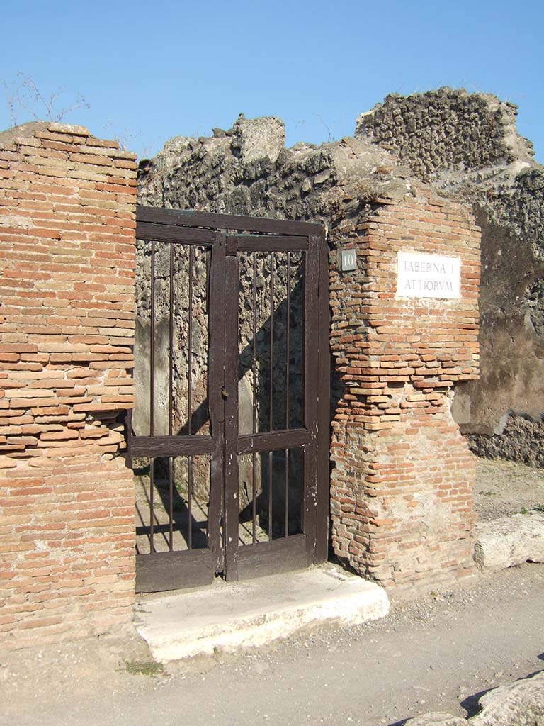 IX.2.10 Pompeii. September 2005. Entrance.
In March 1848, found painted in red on the pilaster on the left, between IX.2.9 and IX.2.10, were

C(aium)  Calventium
II v(irum)  i(ure)  d(icundo)  Chlorus  rog(at)    [CIL IV 921]

Cn(aeum)  Helvium  Sabinum
[…]  o(ro)  v(os)  f(aciatis)    [CIL IV 922]

See PAH II, 477 s, of 18th March 1848, where the above two CIL’s (921 and 922) are reported as being from the left side of the street.
CIL IV 923 below, is indicated as being found on a pilaster on the right side of the street, (i.e. VII.1.22, opposite this house).
See Pagano, M. and Prisciandaro, R., 2006. Studio sulle provenienze degli oggetti rinvenuti negli scavi borbonici del regno di Napoli. Naples: Nicola Longobardi.  (p.164)

According to Cooley, CIL IV 923 graffiti was found at IX.II.9-10, and translated as
We ask for Cn. Helvius Sabinus as aedile. Caprasia votes for him.
See Cooley, A. and M.G.L., 2004. Pompeii: A Sourcebook. London: Routledge. (p.122, F51)

According to Della Corte, on the left of the entrance, between IX.2.9 and IX.2.10, were found the electoral recommendations of the inhabitants:
Chlorus  rog(at)   [CIL IV 921]           Caprasia    [CIL IV 923]
See Della Corte, M., 1965. Case ed Abitanti di Pompei. Napoli: Fausto Fiorentino. (p.209).
