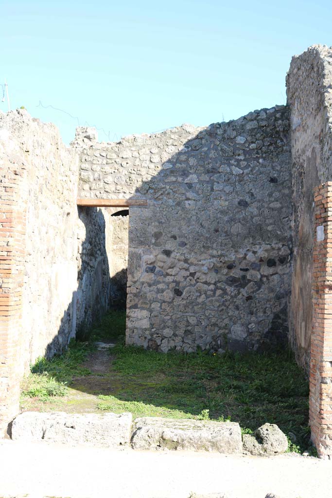 IX.2.11 Pompeii. December 2018. 
Looking towards east wall and doorway into rear room.Photo courtesy of Aude Durand.

