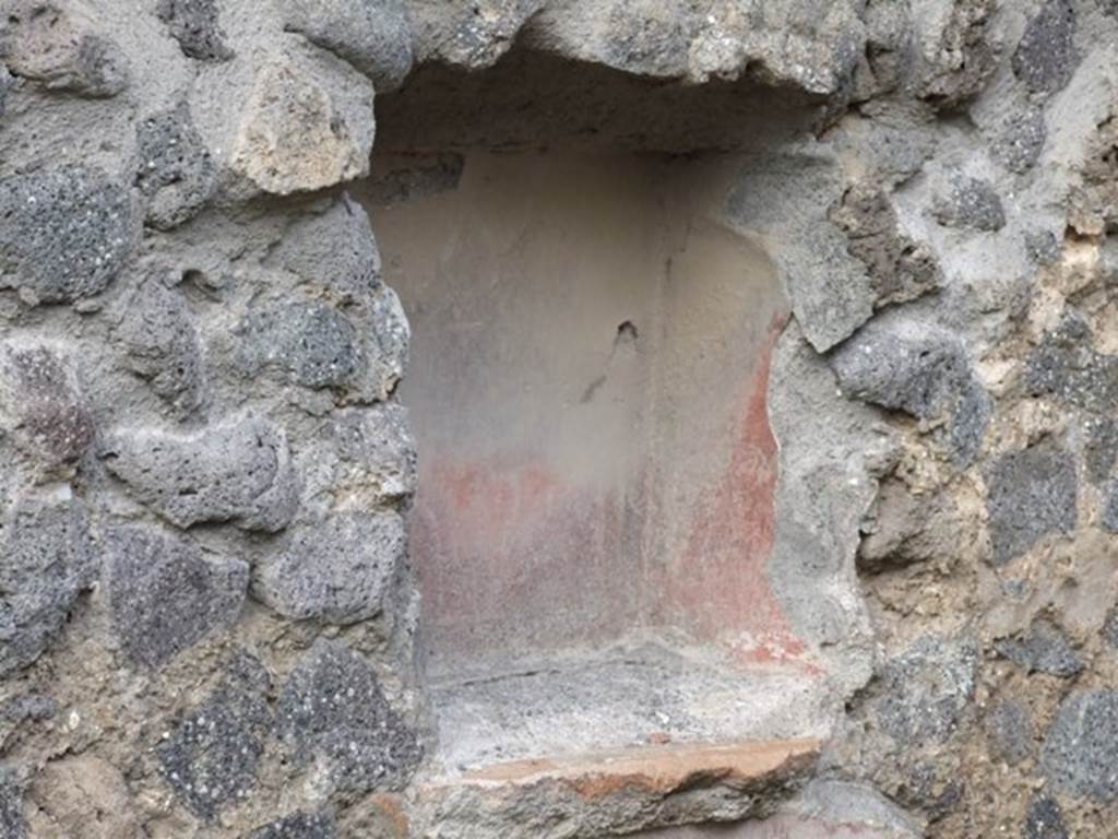 IX.2.12 Pompeii. December 2007. Niche in north wall. According to Boyce, this square niche was painted red on the inside, the same as the one found in IX.2.11. He said that one or both of them may have been lararia.
See Boyce G. K., 1937. Corpus of the Lararia of Pompeii. Rome: MAAR 14. (p.80-81) 
