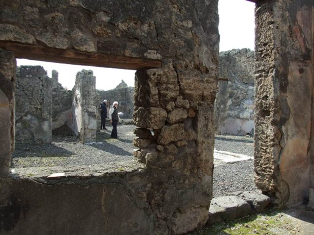 IX.2.18 Pompeii. March 2009.  Room 3.  Triclinium, West wall, with door and window to Atrium.