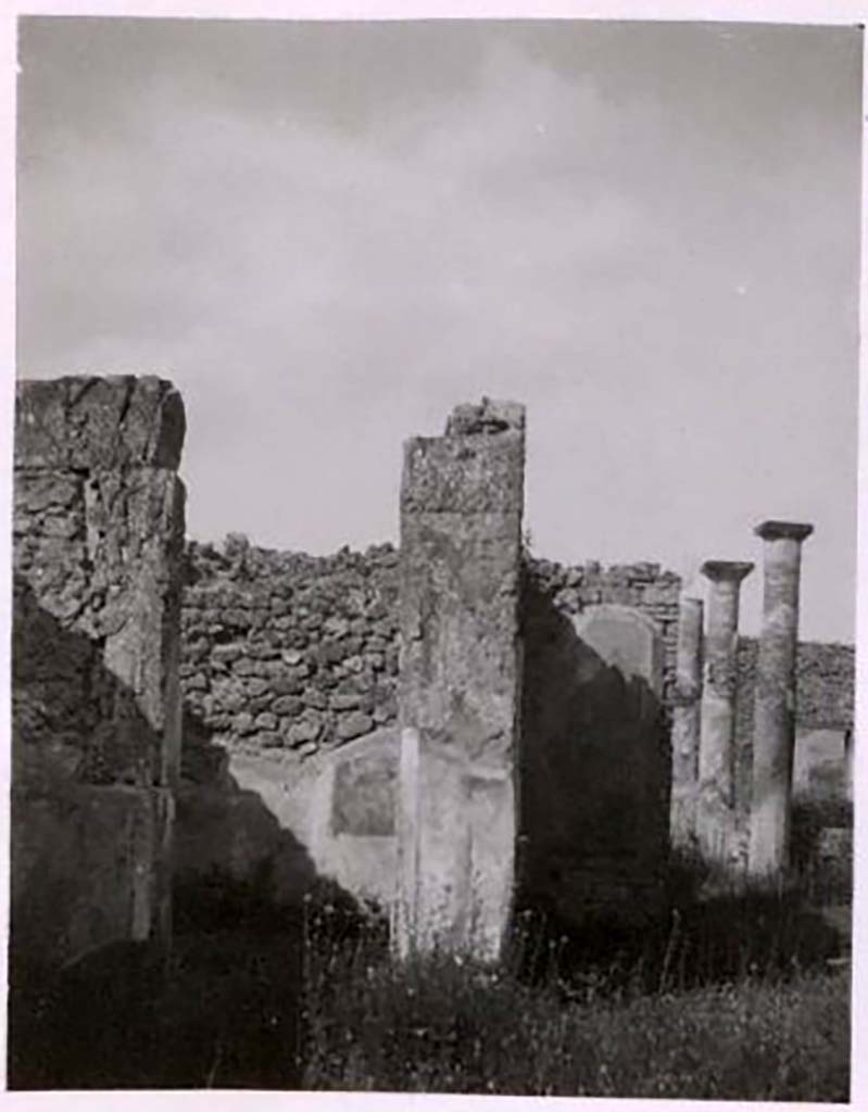 IX.2.18 Pompeii. Pre-1943. Photo by Tatiana Warscher.
Looking across atrium towards doorway to room 4, on left. The south side of the tablinum is on the right. 
See Warscher, T. Codex Topographicus Pompeianus, IX.2. (1943), Swedish Institute, Rome. (no.98.), p. 179.


