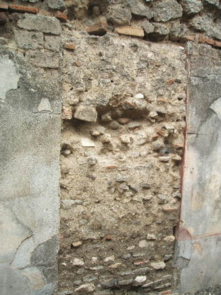 IX.2.23  Pompeii.  May 2005. East wall with blocked door.