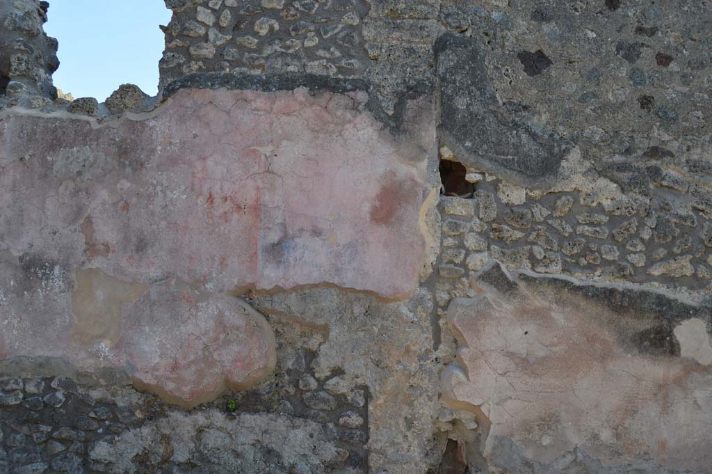 IX.2.26 Pompeii. March 2019. 
Front façade, detail of red and black painted panels, below kitchen window on west side of doorway. 
On the right would be IX.2.27.
Foto Taylor Lauritsen, ERC Grant 681269 DÉCOR.
