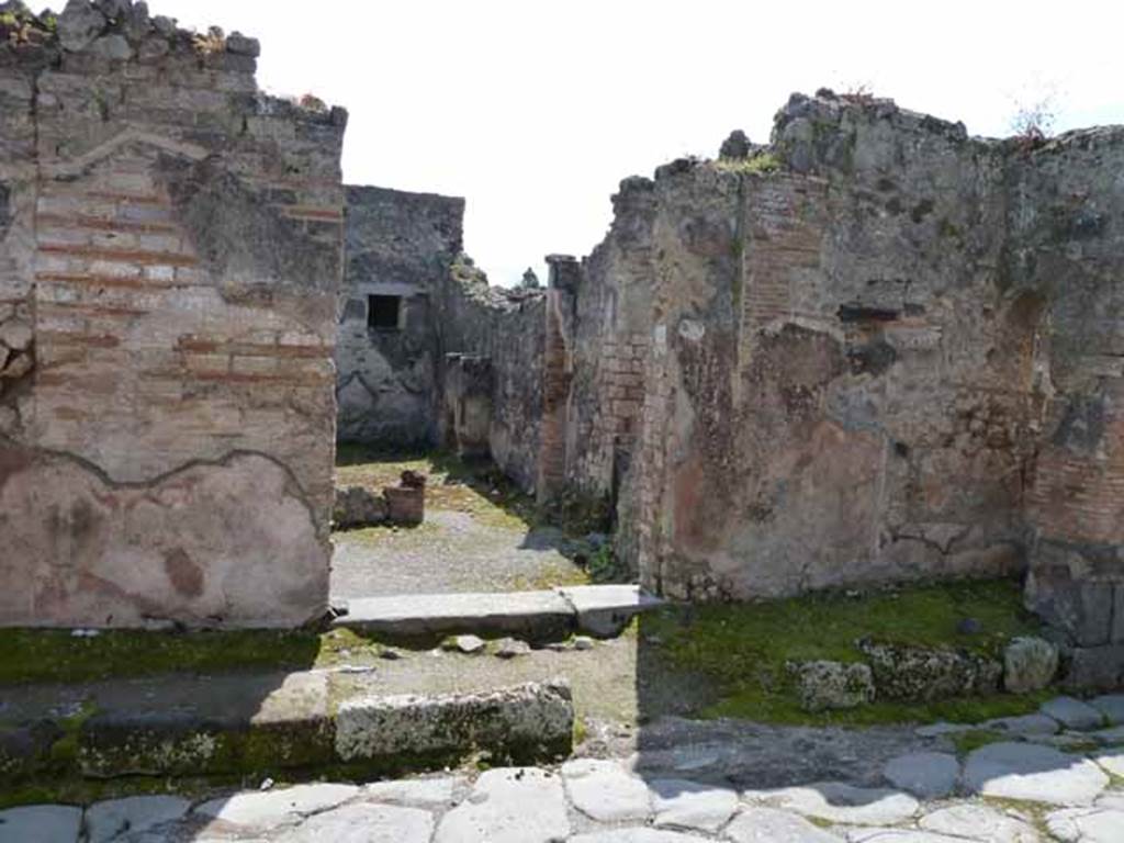 IX.2.27 Pompeii. May 2017. Looking south-east across the remains of the portico. 
Photo courtesy of Buzz Ferebee.
