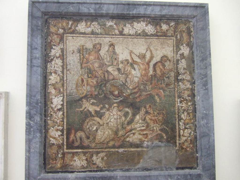 IX.2.27 Pompeii. Mosaic of Neptune and Amphitrite in a chariot, this was found in a triclinium on east side of peristyle.  
This was the emblema in the centre of a border of black and white mosaic of meanders and squares. 
Now in Naples Archaeological Museum, inventory number 10007.
According to PPM –
“And in front of it, placed towards the entrance, was another complicated decorative motif, now lost.”
See Carratelli, G. P., 1990-2003. Pompei: Pitture e Mosaici. IX. (9). Roma: Istituto della enciclopedia italiana, (p. 117, no.2).

