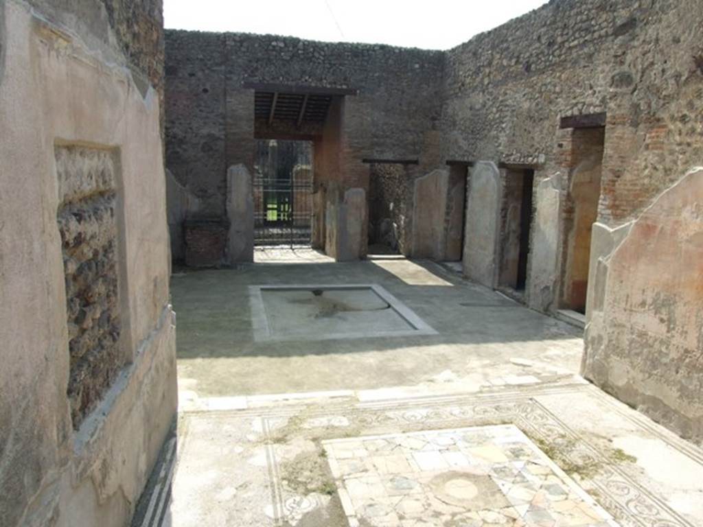 IX.3.5 Pompeii. March 2009.  Looking west from raised garden into tablinum, and through atrium to the entrance.
