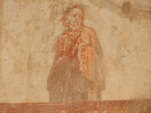 IX.3.5 Pompeii. May 2015. Room 13, detail of figure at upper east end of south wall. 
Photo courtesy of Buzz Ferebee.
