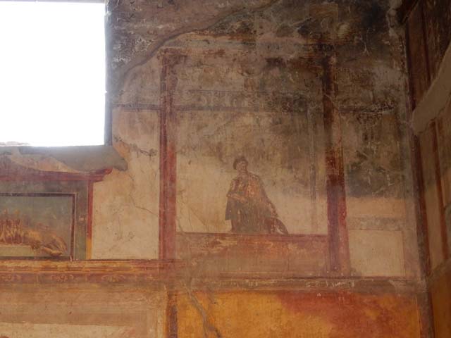 IX.3.5 Pompeii. May 2015. Room 13, painting of figure at upper west end of south wall. Photo courtesy of Buzz Ferebee.


