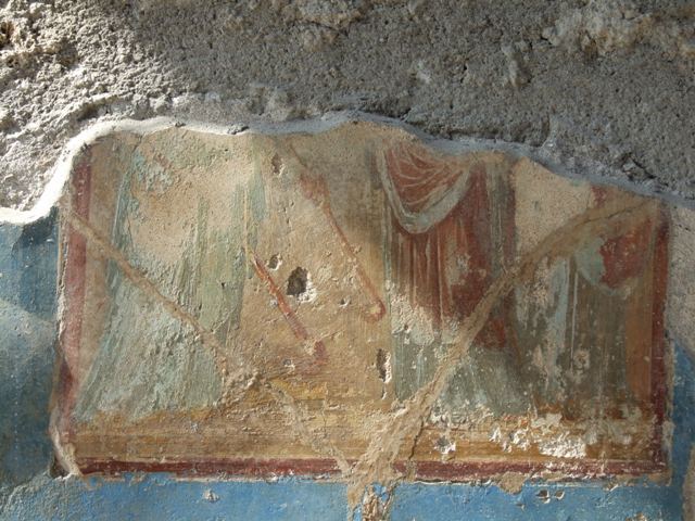 IX.3.5 Pompeii. March 2009. North wall of fauces, remains of wall painting of Ceres.