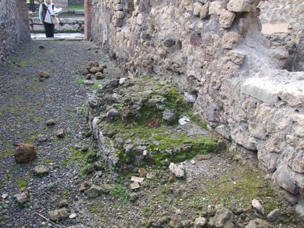 IX.3.8. Pompeii.December 2007. Looking west to front of shop, steps against north wall.