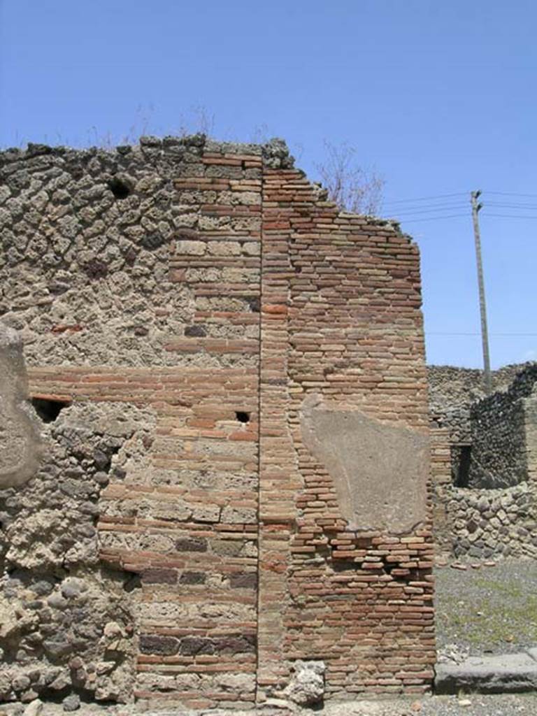 IX.3.13 Pompeii. June 2005. Pilaster on west (left) of entrance doorway. Photo courtesy of Nicolas Monteix.