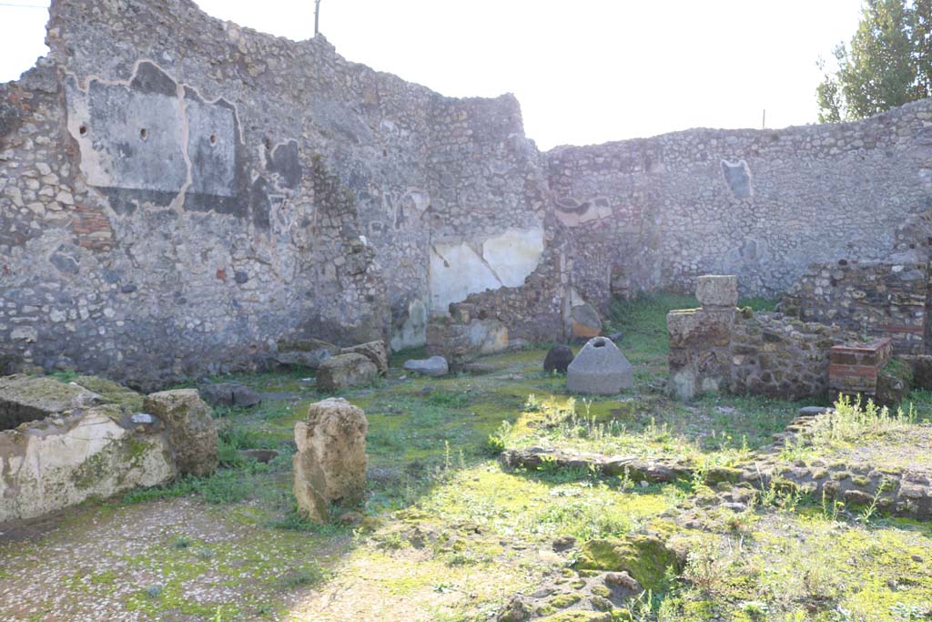 IX.3.21 Pompeii. December 2018. 
Looking south-west along south wall, towards west rear wall, on right.  Photo courtesy of Aude Durand.

