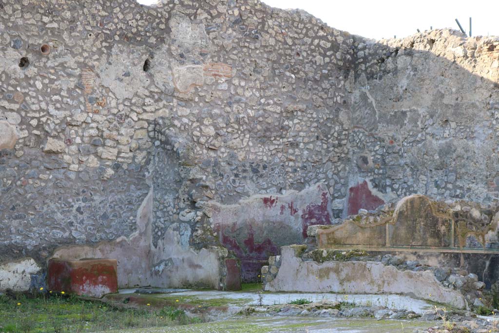 IX.3.22 Pompeii. December 2018. 
Looking towards room in north-west corner, with red painted wall decoration. Photo courtesy of Aude Durand.
