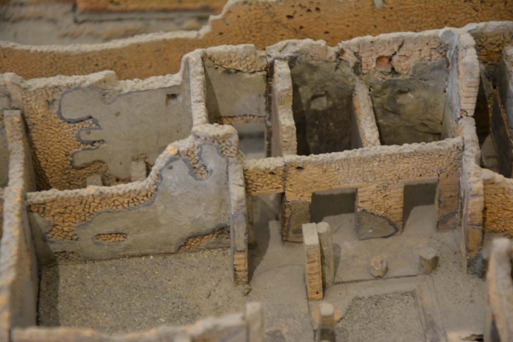 IX.5.2 Pompeii. July 2017. Side rear doorway at IX.5.22, in centre, with rooms in south-west corner around peristyle.
From cork model in Naples Archaeological Museum.
Foto Annette Haug, ERC Grant 681269 DÉCOR
