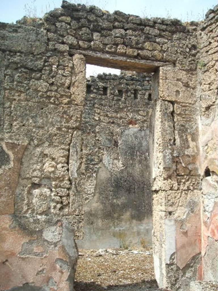 IX.6.5 Pompeii. May 2005. Doorway to room “a” in north-west corner of atrium, oecus or triclinium.
