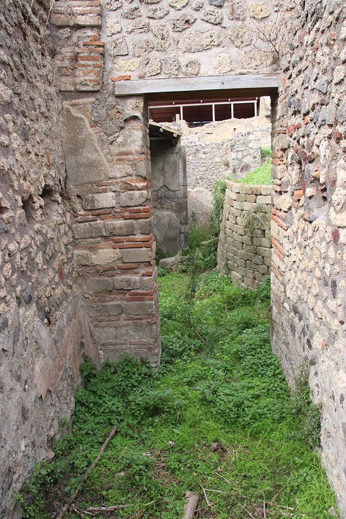 IX.7.16 Pompeii. October 2024. Room 3, looking north towards doorway to atrium. 
According to Boyce, this room would have led into the kitchen. 
Photo courtesy of Klaus Heese.
