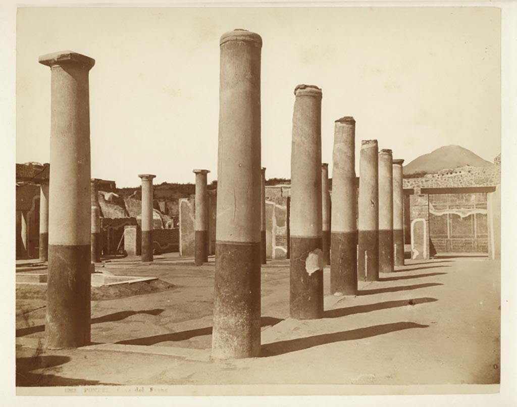 IX.8.6 Pompeii. Looking north along east portico towards doorway to room 11, on right.
Photograph No. 1283, by Giorgio Sommer, (1834-1914), described as Casa del Fauno.
Public domain, via Wikimedia Commons.
