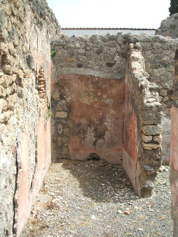IX.8.b Pompeii. February 2020. 
Looking south-west across atrium, towards niche in south wall, on left, and entrance doorway in west wall, in centre.
Photo courtesy of Aude Durand.
