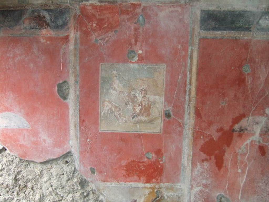 IX.9.c Pompeii. December 2005. Centre of west wall of room in north-west corner of the peristyle.