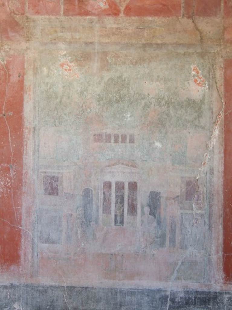 IX.9.c Pompeii. March 2009. Architectural painting with figures and statue of divinity, from centre of west wall of triclinium.