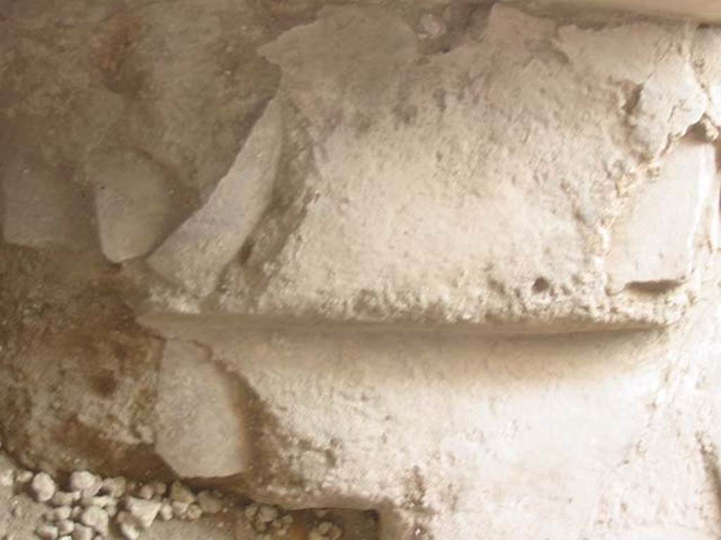 IX.11.2 Pompeii. May 2003. Remains of storage shelves at south-east end of counter. Photo courtesy of Nicolas Monteix.