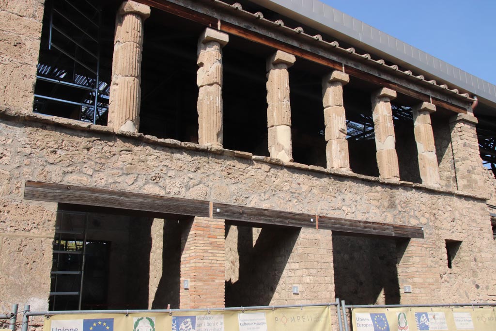 IX.12.3-5 Pompeii. Pompeii. October 2023. Looking north to entrance doorways and upper floor room. Photo courtesy of Klaus Heese.