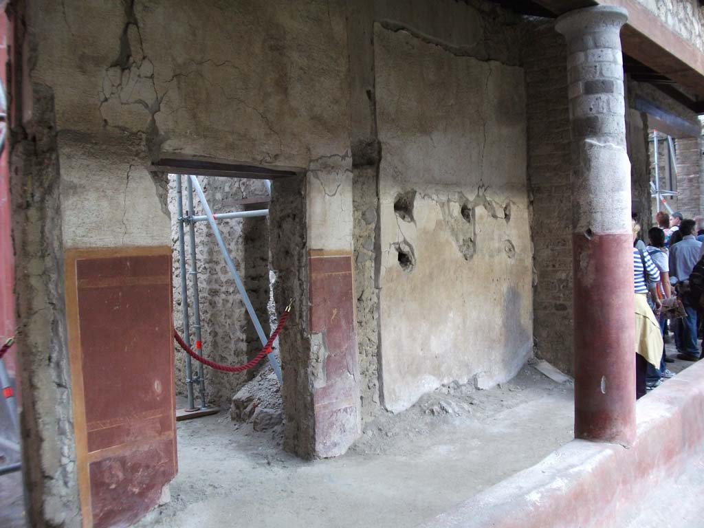 IX.12.9 Pompeii. May 2010. East portico with doorway to room 15, kitchen.