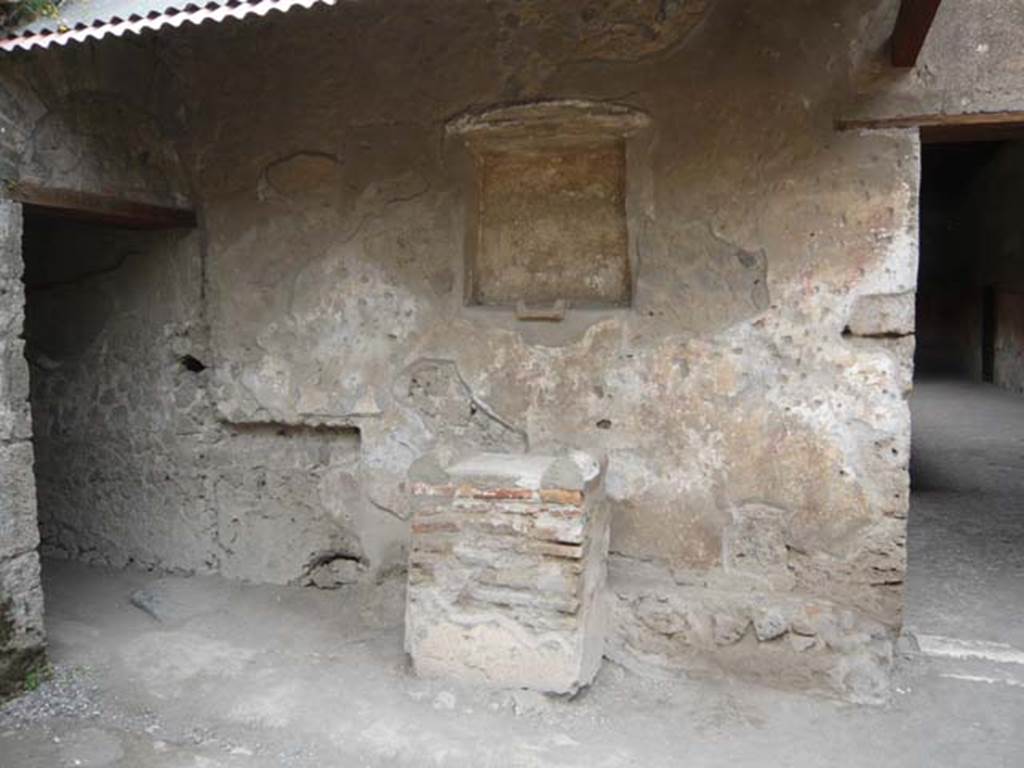 Villa of Mysteries, Pompeii. May 2012. Room 61, kitchen courtyard. North side with lararium and altar. Photo courtesy of Buzz Ferebee.
