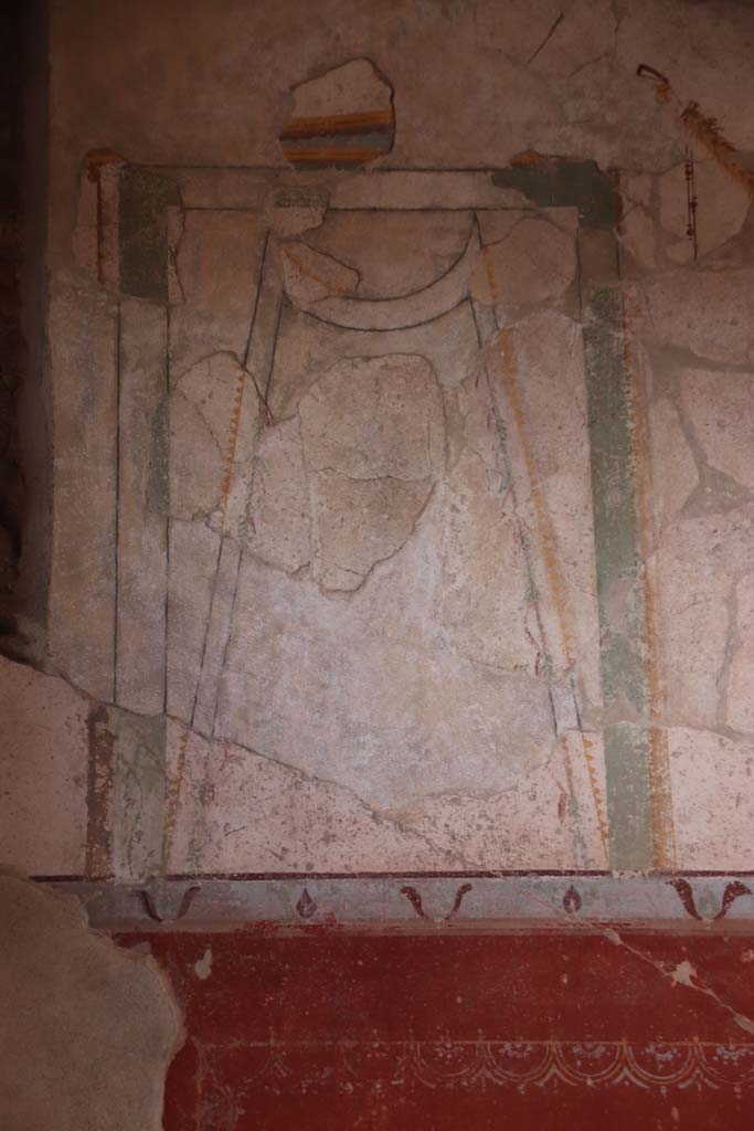Villa Regina, Boscoreale. September 2021. 
Triclinium IV, detail of painted decoration on upper west wall. Photo courtesy of Klaus Heese.
