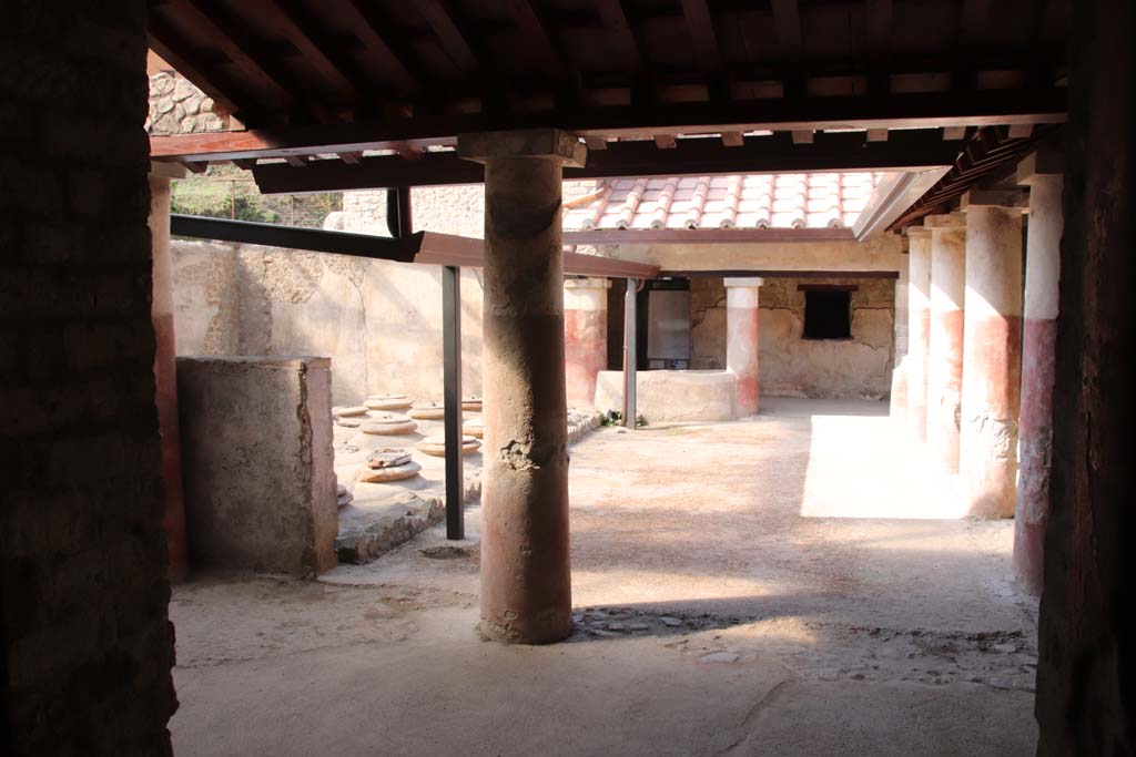 Villa Regina, Boscoreale. September 2021. Looking south across north portico from triclinium IV. Photo courtesy of Klaus Heese.