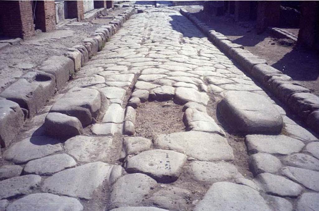 Via delle Terme. July 2011. Looking east between VI.8 and VII.5. Photo courtesy of Rick Bauer.