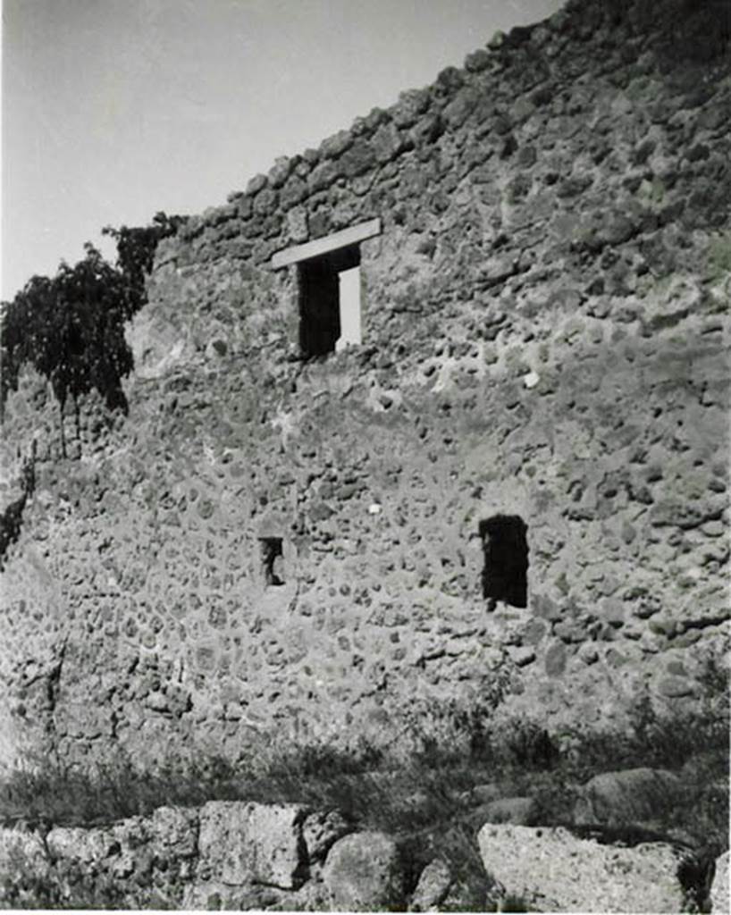 Vicolo del Conciapelle. 1935 photo taken by Tatiana Warscher. Looking towards wall of I.2.30, and façade on north side of vicolo.  
See Warscher T., 1936. Codex Topographicus Pompeianus: Regio I.2. (no. 64), Rome: DAIR, whose copyright it remains.
