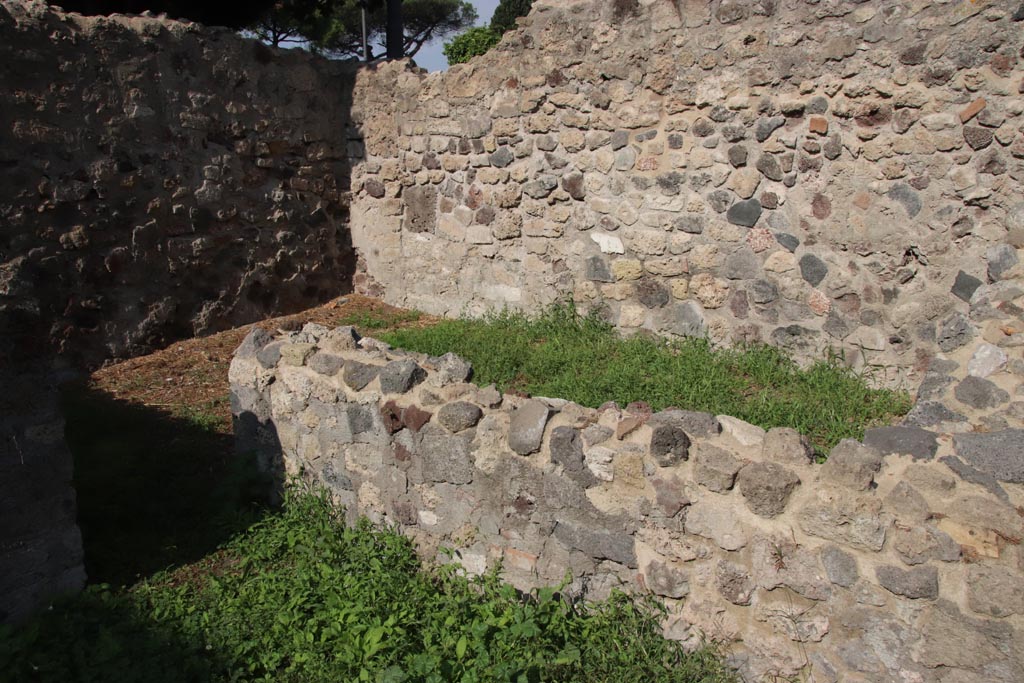 HGW25 Pompeii. Part of Villa of Diomedes. October 2023. 
Doorway to room 7,10 combined with room 7,11. In the north-west corner there is a blocked doorway. Photo courtesy of Klaus Heese.
