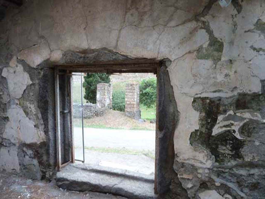 Pompeii Porta Nocera. May 2010. Tomb 9ES. Looking north to interior entrance doorway onto Via delle Tombe.