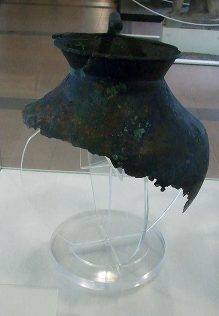 Villa of P Fannius Synistor at Boscoreale. Room 24. Room of the press. Remains of bronze vase with inscription on rim. Now in Boscoreale Antiquarium. Inventory number 16994.