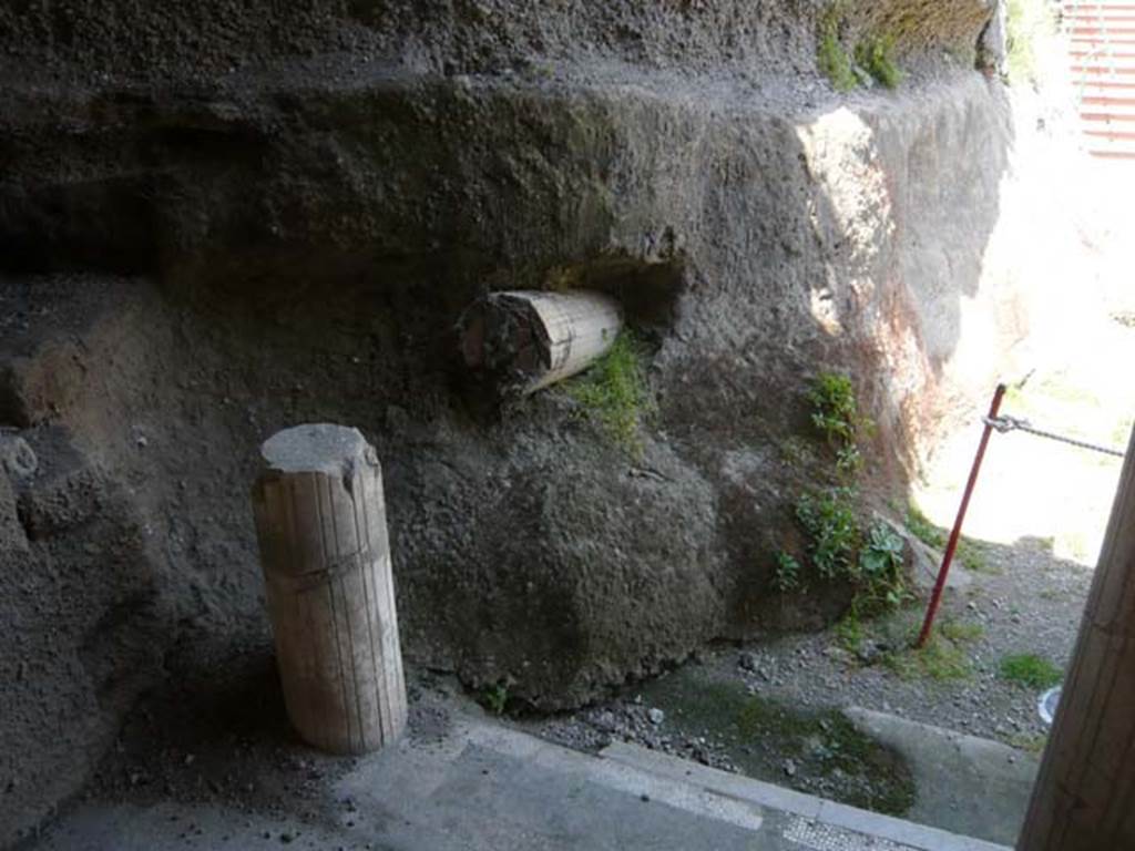 Oplontis, May 2011. West portico 33, looking north-west at a column snapped off and embedded in the pyroclastic flow debris. This can be seen on the extreme west of the portico, at the bottom of the entrance stairs. Photo courtesy of Buzz Ferebee.
