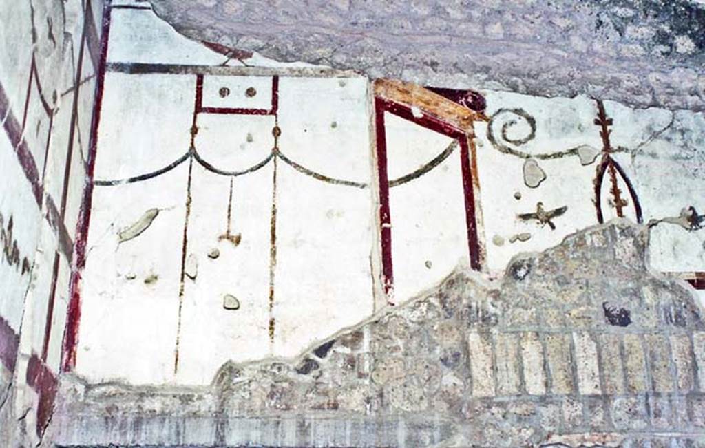 Oplontis Villa of Poppea, October 2020. Room 4, detail of decoration above entrance to corridor 6 in north-west corner. 
Photo courtesy of Klaus Heese. 
