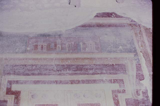 Oplontis, 1973. Room 5, detail above painted door in atrium. Photo by Stanley A. Jashemski. 
Source: The Wilhelmina and Stanley A. Jashemski archive in the University of Maryland Library, Special Collections (See collection page) and made available under the Creative Commons Attribution-Non Commercial License v.4. See Licence and use details. J73f0371
