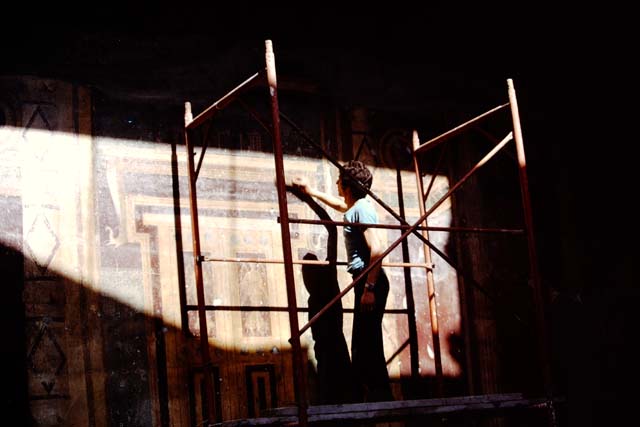 Oplontis, 1975. Room 5, restoration of painted wall with imitation doorway. Photo by Stanley A. Jashemski.   
Source: The Wilhelmina and Stanley A. Jashemski archive in the University of Maryland Library, Special Collections (See collection page) and made available under the Creative Commons Attribution-Non Commercial License v.4. See Licence and use details. J75f0449

