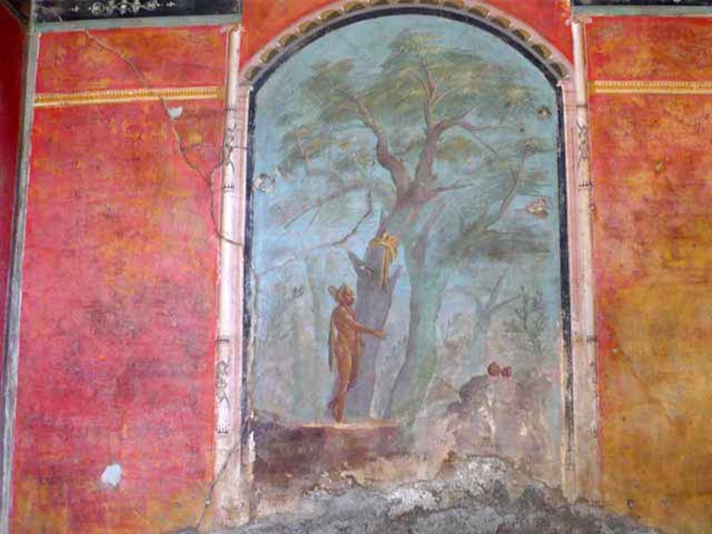 Oplontis, May 2011. Room 8, painted upper east wall. In the centre is a painting of a poet playing the lyre. On either side of him are painted peacocks. Below them are painted panels of scenes and landscapes taken from daily life.  Photo courtesy of Buzz Ferebee.
