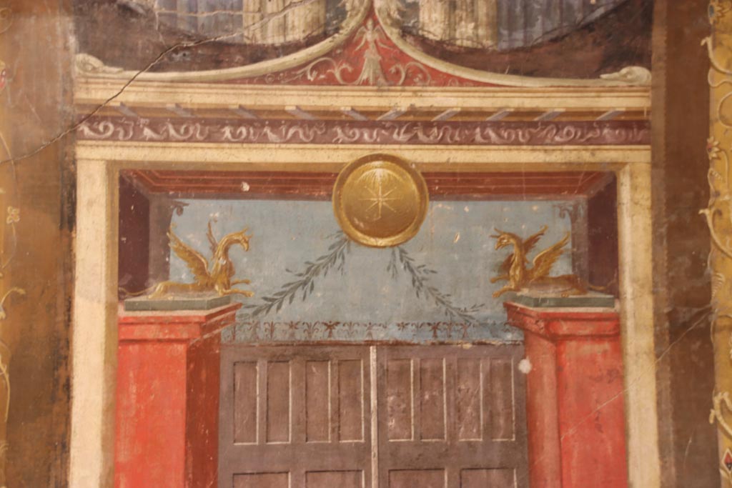 Oplontis Villa of Poppea, September 2021.  
Room 14, detail of painted decoration from right side of central panel of west wall of triclinium. 
Photo courtesy of Klaus Heese.
