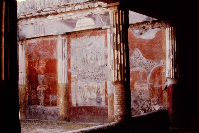 Oplontis, 1975. Area 20, the enclosed garden, looking towards the north-east corner. 
The white painted circles are the locations of the root cavities. According to Wilhelmina, “In the north-west, north-east and south-west corners a root cavity was found. There was not one found in the south-east corner as this would have blocked the entrance to the garden.” Photo by Stanley A. Jashemski.   
Source: The Wilhelmina and Stanley A. Jashemski archive in the University of Maryland Library, Special Collections (See collection page) and made available under the Creative Commons Attribution-Non Commercial License v.4. See Licence and use details. J75f0524
