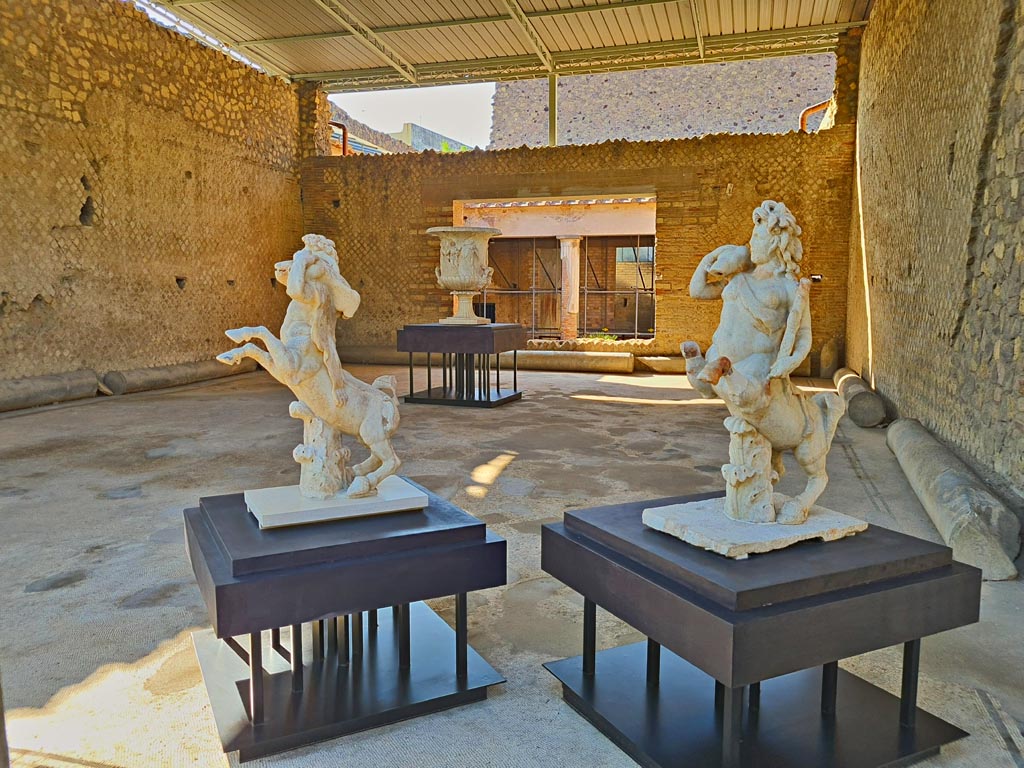 Oplontis, September 2015. Room 21, looking south. As the walls were found with no decoration, it is thought that there had not been time to start to decorate them before the eruption. The remodelling of the Villa was also the probable reason why the columns from the swimming pool portico had been moved from their original place, and were discovered situated along the walls of this room.

