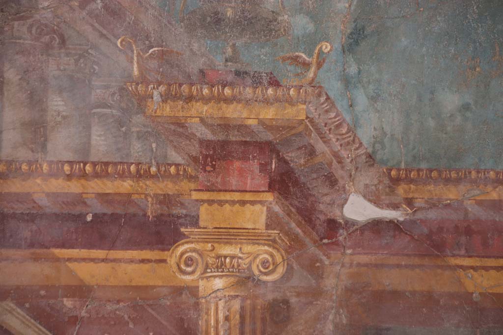Oplontis, 1974. Room 23, detail from side wall showing a painted table with a column-like foot, a bunch of grapes and a bird. Photo by Stanley A. Jashemski.   
Source: The Wilhelmina and Stanley A. Jashemski archive in the University of Maryland Library, Special Collections (See collection page) and made available under the Creative Commons Attribution-Non Commercial License v.4. See Licence and use details. J74f0655
