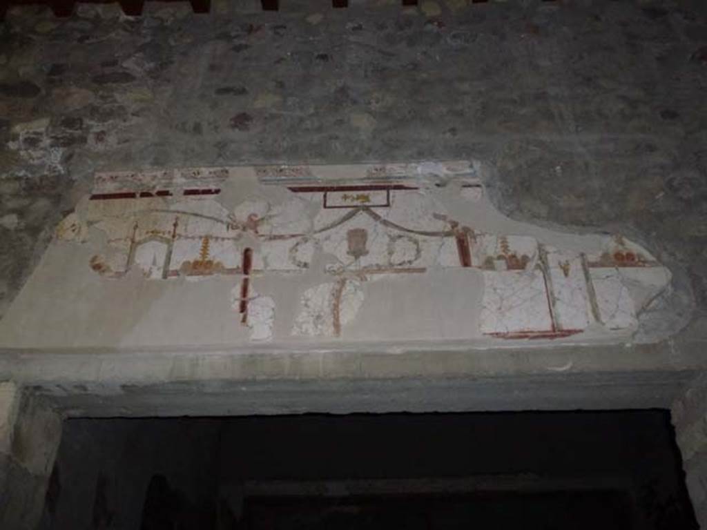 Oplontis, May 2011. Portico 24, detail of painted plaster above the doorway leading into room 41, the cubiculum with two alcoves. Photo courtesy of Michael Binns.
