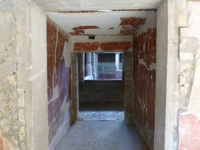 Oplontis, September 2015. Room 25, doorway from Portico 24, looking north-west.