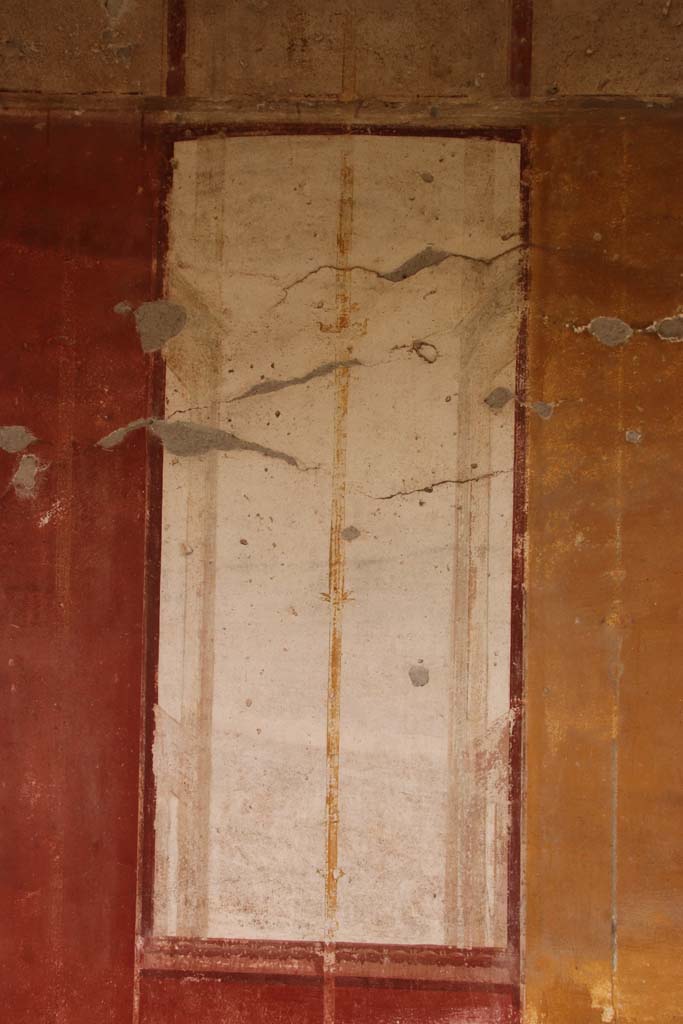 Oplontis, September 2015. East Portico 34, remains of painted peacock in centre of yellow panel.